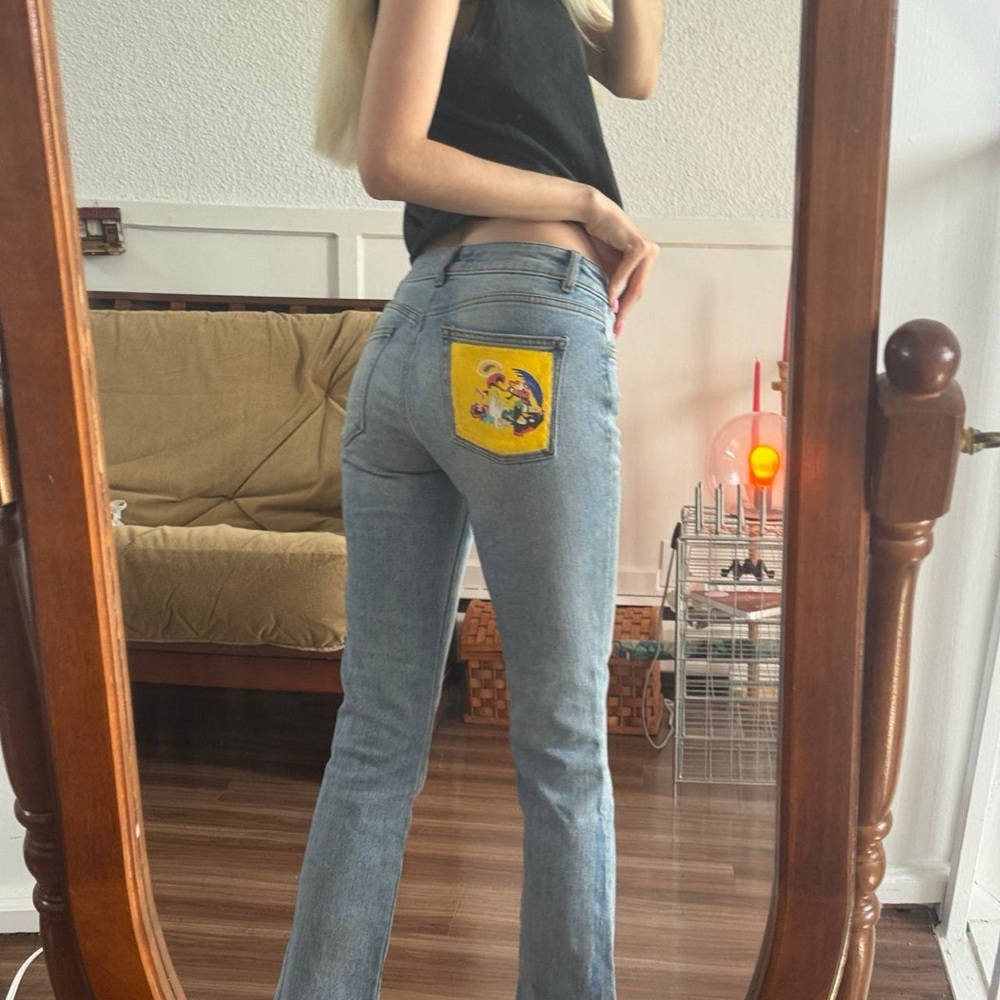Stylish Blue Jeans with Yellow Pocket Detail